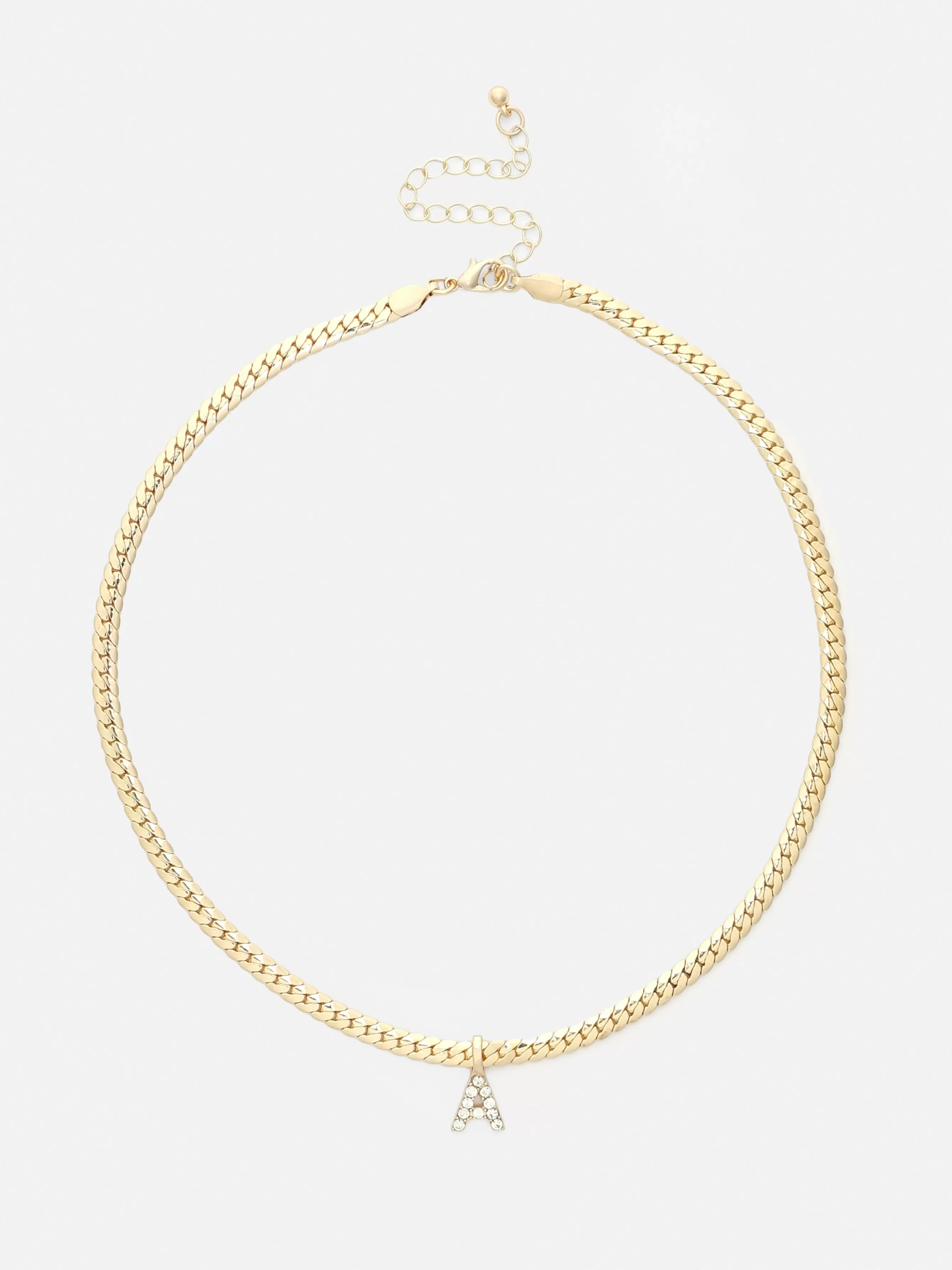 Shop Primark Collier Chaîne Serpent Avec Initiale En Strass Jaune